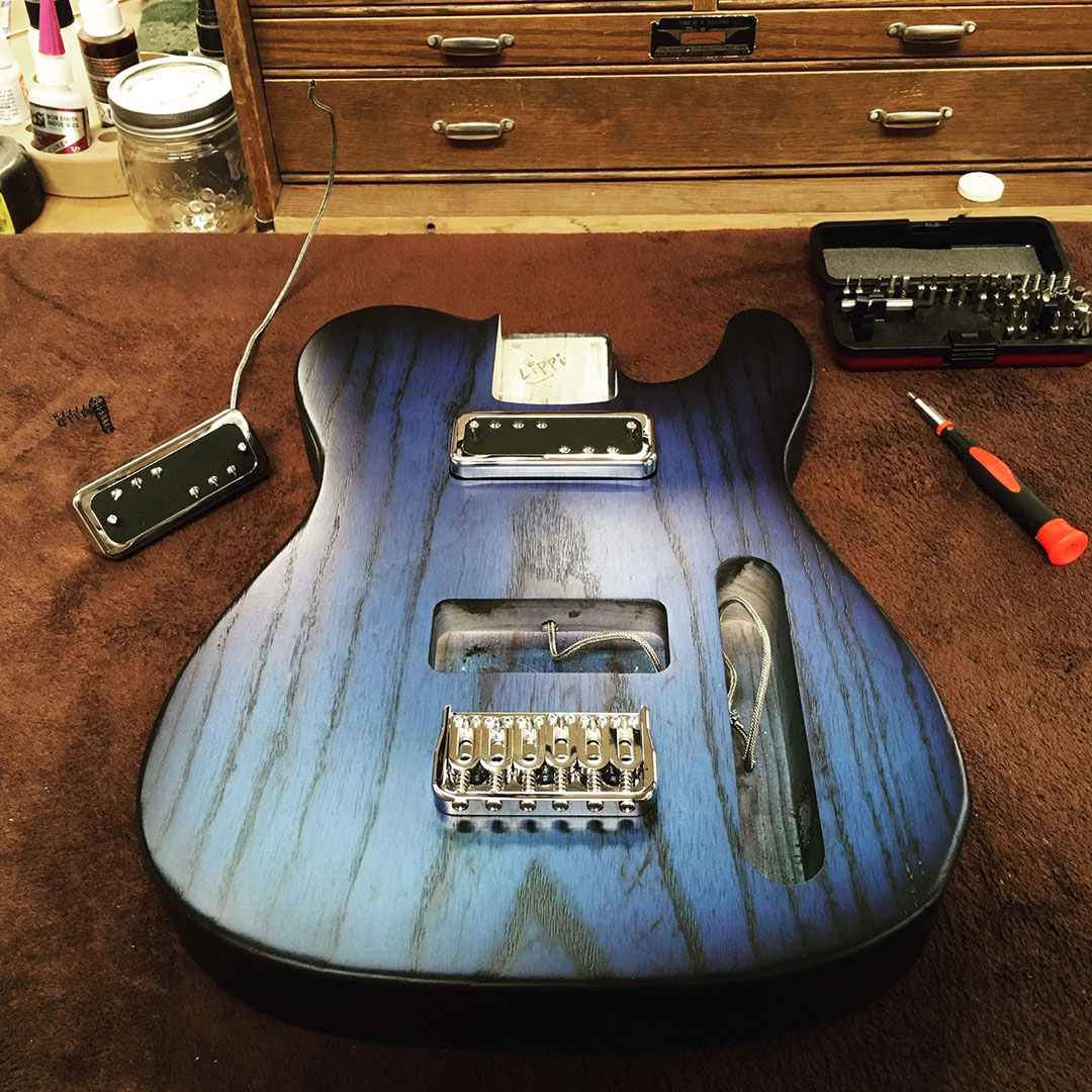 roberto venn team lippi mini blue tele repair John Lippi
